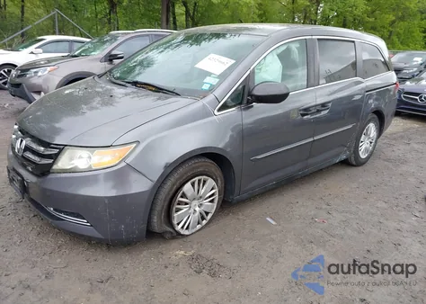 2014 Honda Odyssey Lx z USA, uszkodzony, nr VIN 5FNRL5H24EB129725